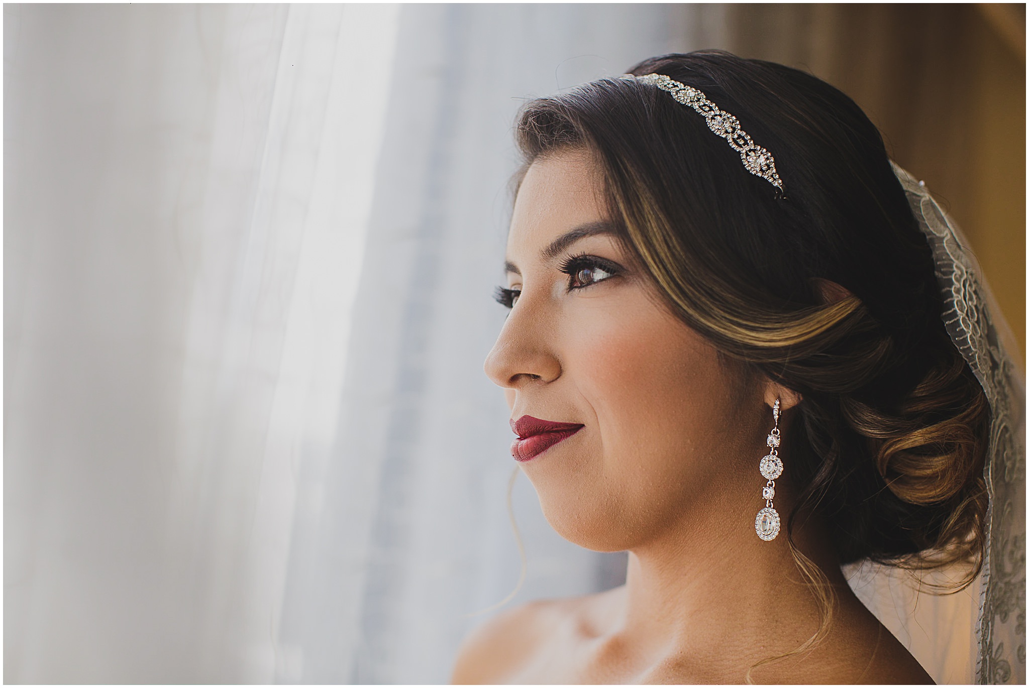 red lipstick bride hair pinned up