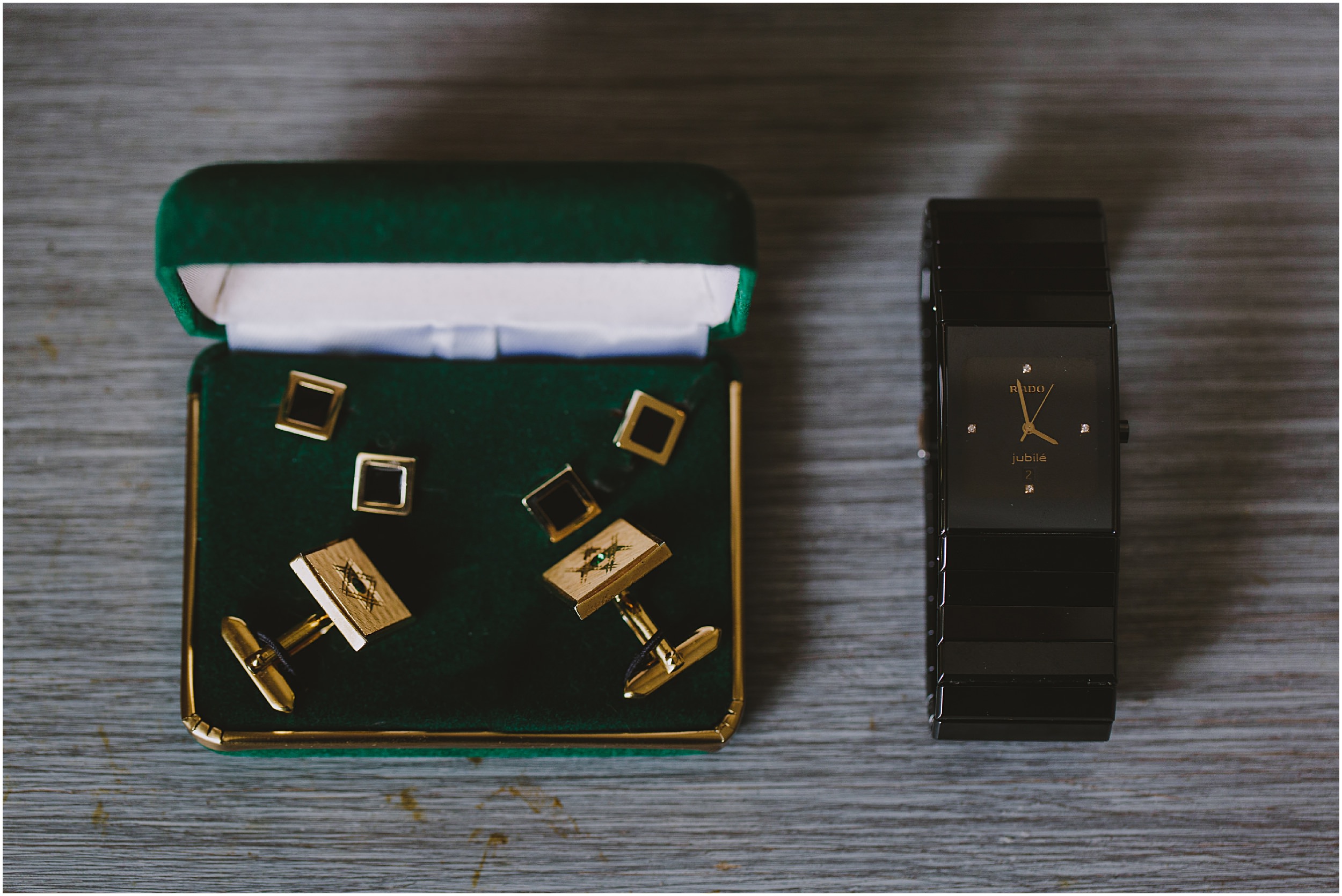 gold cuff links and black watch