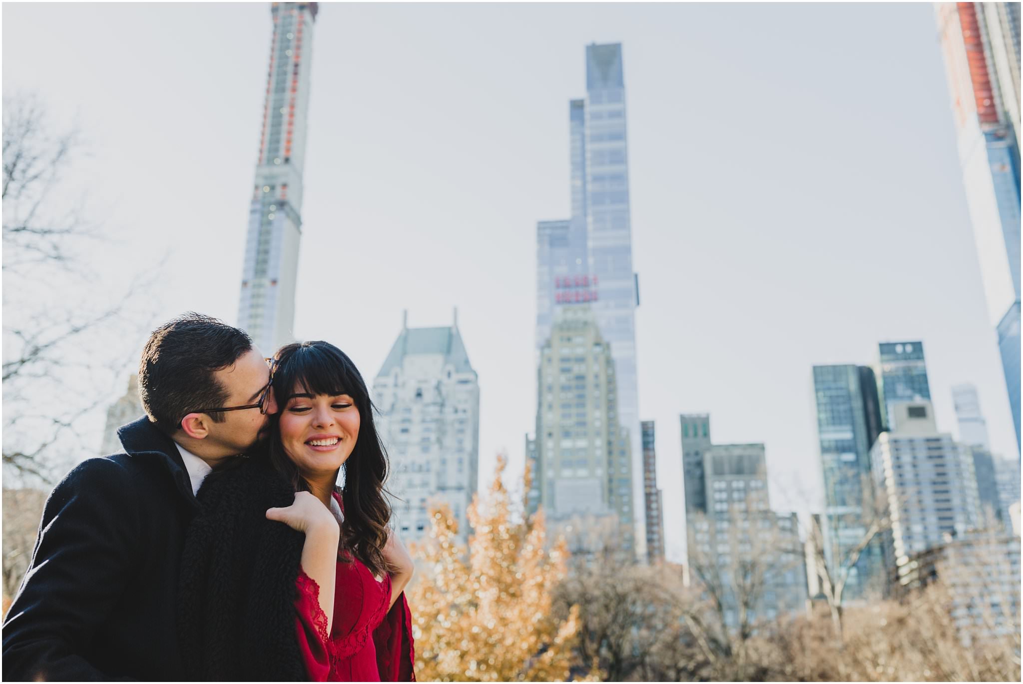 couple in front of NYC skyline