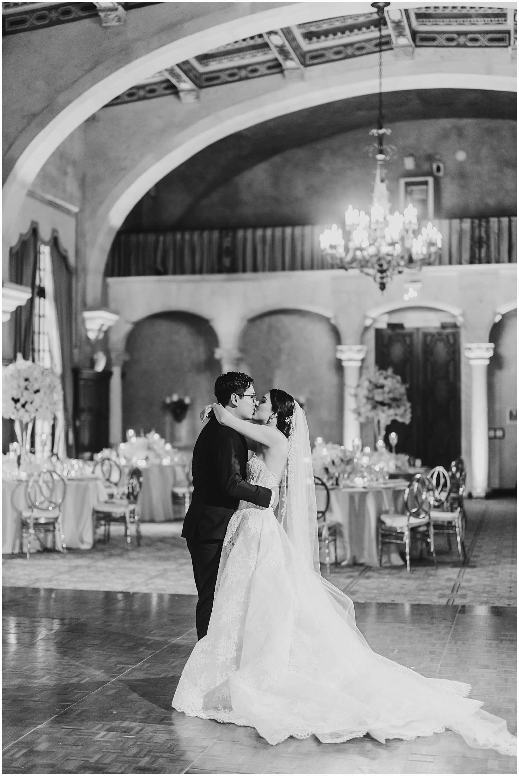 black and white portrait of the couple slow dancing in the Alhambra ballroom.